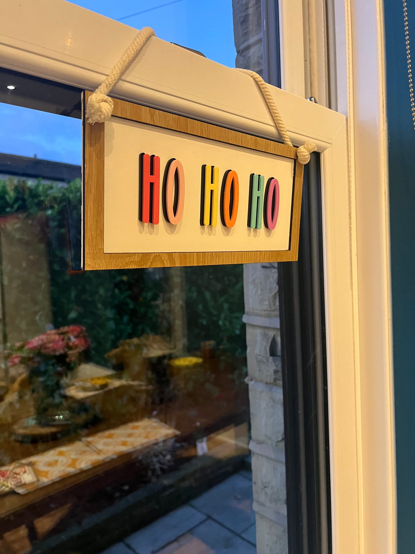 Colourful Ho Ho Ho hanging Christmas sign